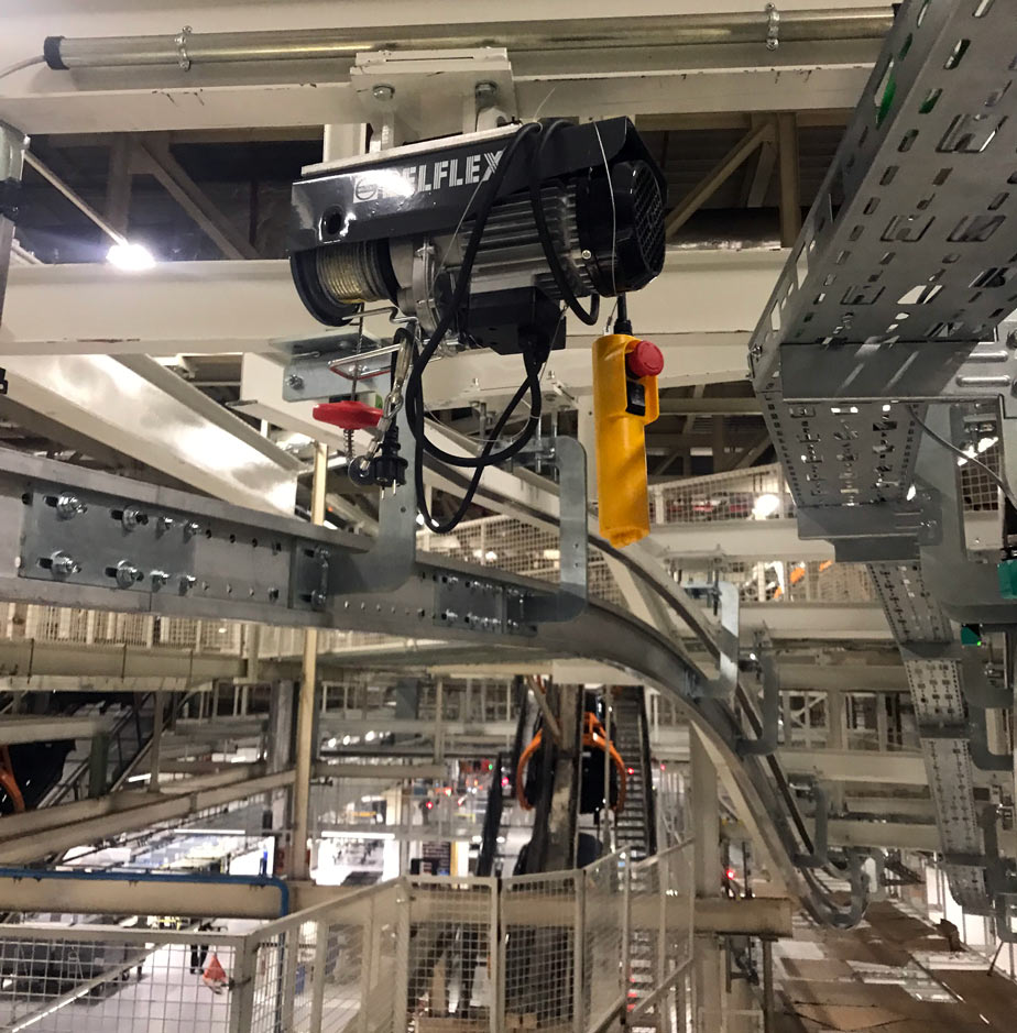 jervis-b-webb-transporte-automatizado-industrial-EMS-carril-electrificado-