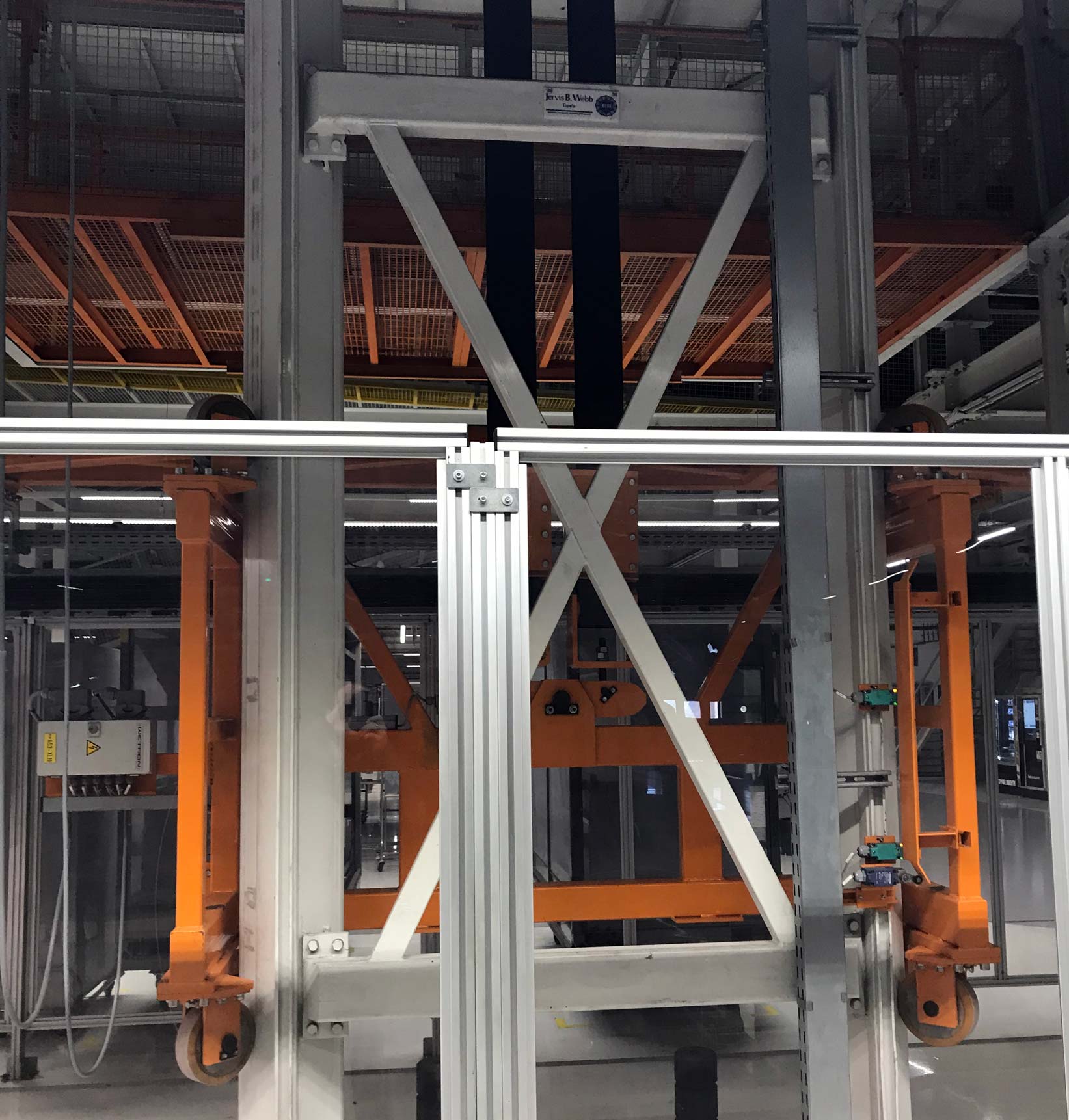 jervis-b-webb-transporte-automatizado--Montacargas-elevadores-industriales-