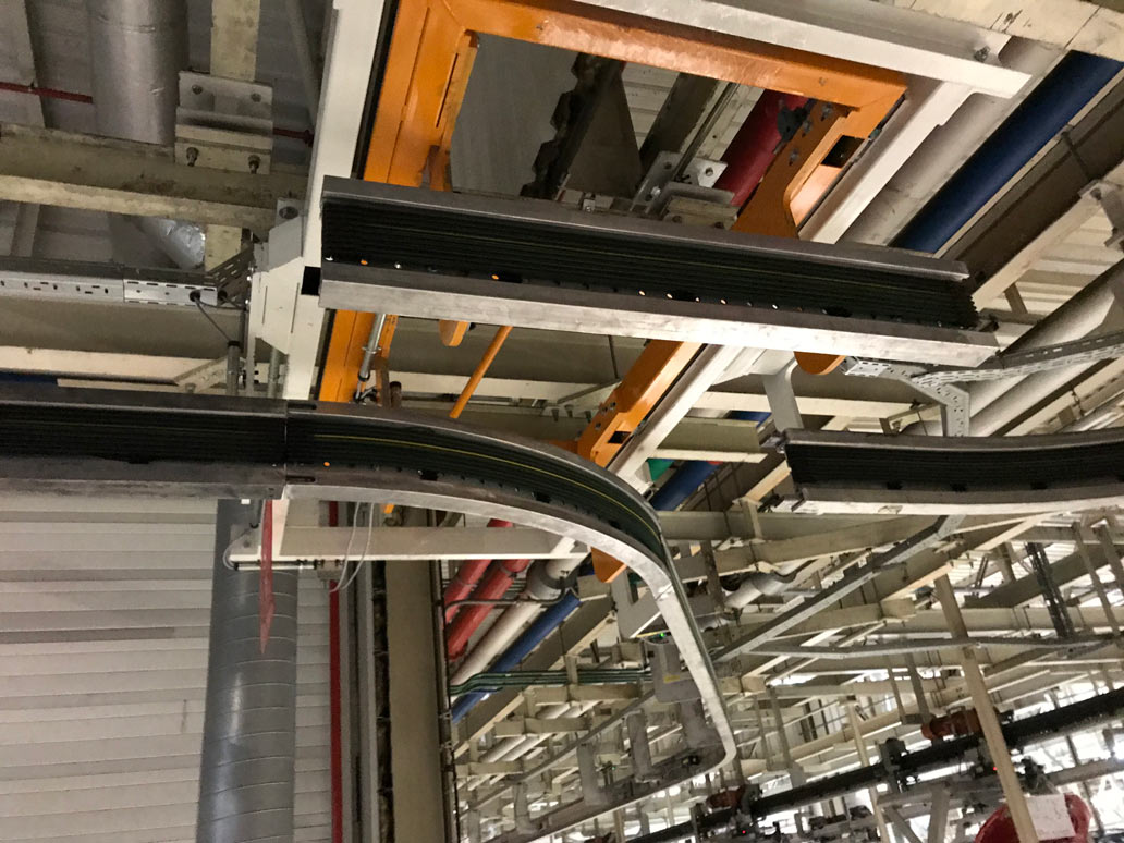 jervis-b-webb-transporte-automatizado-industrial-EMS-carril-electrificado-