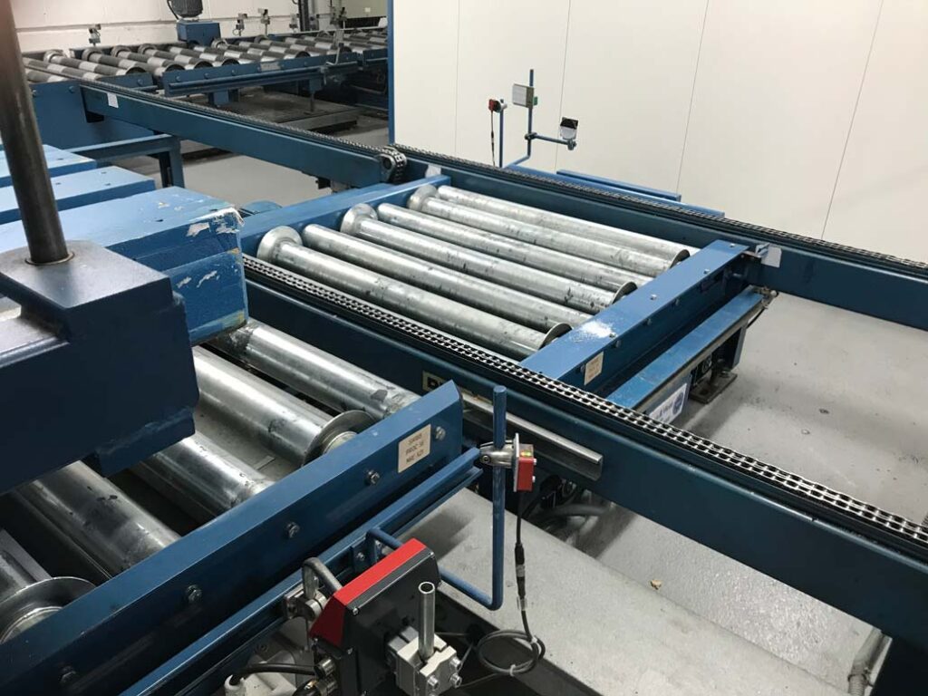 jervis-webb-spain-Rodillos-Motorizado-Transmisión-Cadena-